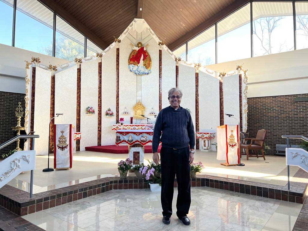 Fr. Joseph J. Palackal, CMI. in front of Altar<br/>St. Thomas Syro Malabar Church, Hardford, Connecticut, USA